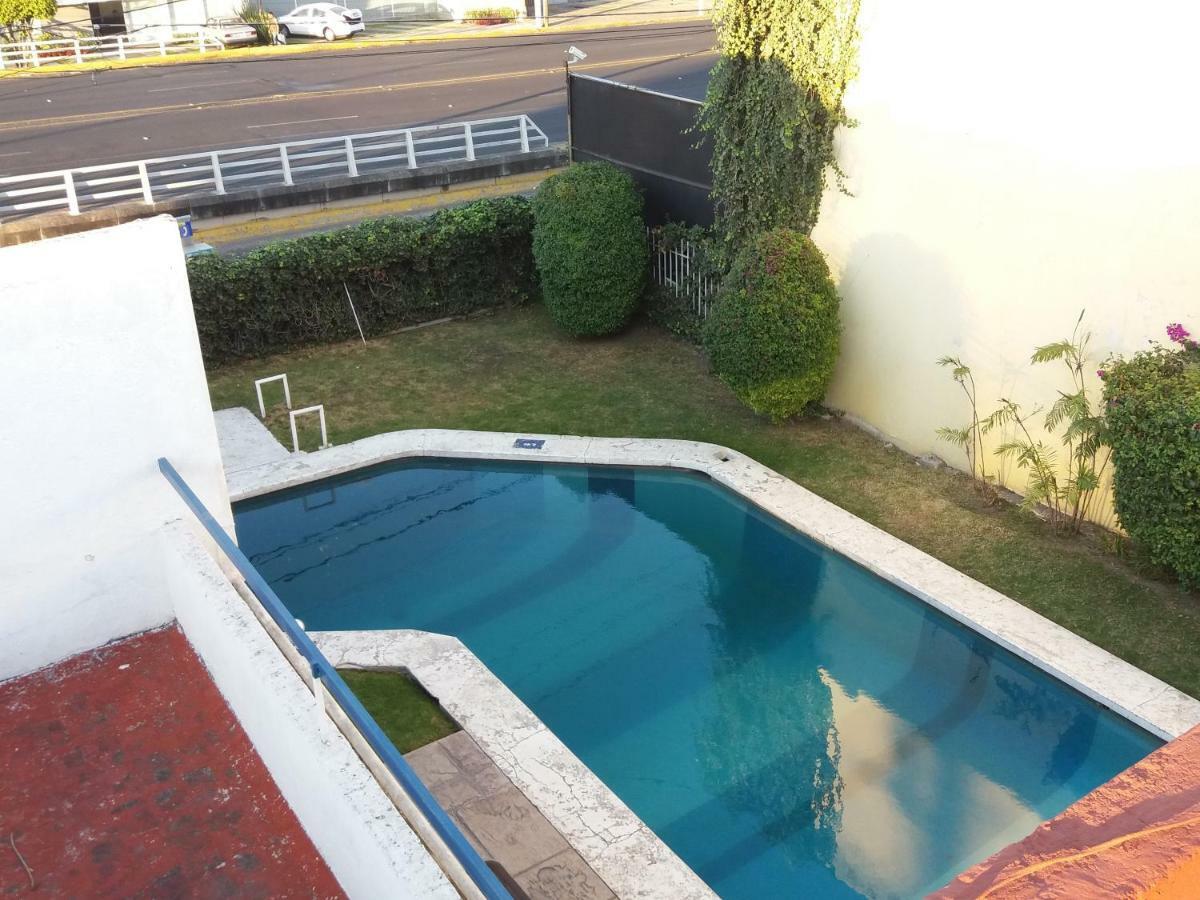 Junto Glorieta La Minerva Hotel