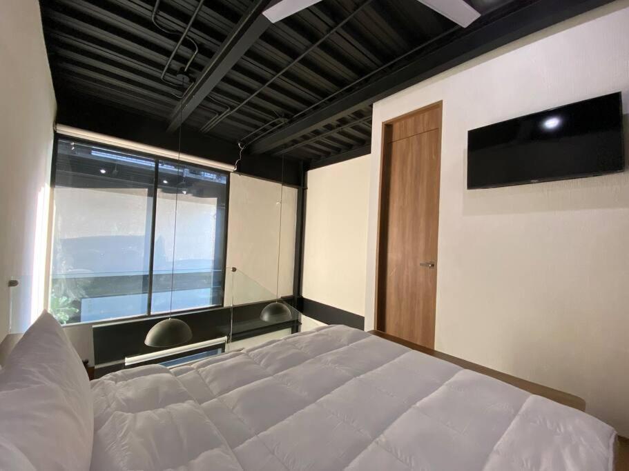 Loft Doble Altura / Chapu 102 @serra Apartamento *
